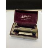 A vintage cased Gillette Safety Razor in metal box