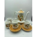 Coffee set hand painted by M Fenton to include lidded coffee pot; 4 cups and saucers and creamer