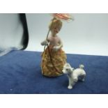 Vintage Ceramic Lady walking her dog 5 1/2 inches tall including parasol