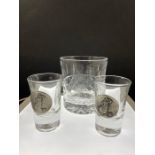 three glasses i tumbler with the Mac Donald Crest and two golfing shot glasses