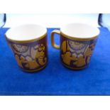pair of Hornsea elephant mugs 1973