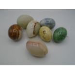 collection of marble and onyx eggs