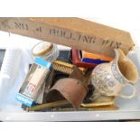 A box of various items to include a boxed Pyrex rolling pin, card games, china jug etc...