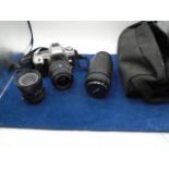 Minolta maxxum camera with bag and few accessories and a sigma lens from house clearance