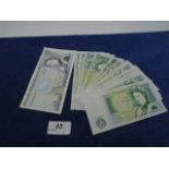 12x Green One Pound notes (DU, DW, O, C, DY, DS and DX), a few consecutive and a blue Five Pound