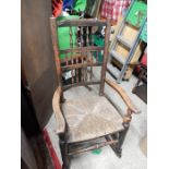 Rush seat stick back rocking chair