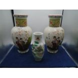 pair of oriental style vases 33cm tall and smaller one at 21cm