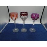 3 tall glasses approx 20cm tall cranberry glass