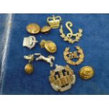 Military cap badges/ uniform badges to include The Essex Regt, as found