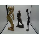 3 statues one bronzed couple, wooden aboriginal woman, wooden sprite