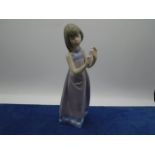 Lladro girl with rolling pin, stamped- 5600,E12a