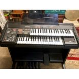 Tecnics electric organ with stool and book