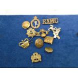 Military cap/ uniform badges and buttons, as found