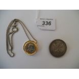 A Gold plated pendant and chain and a 50 Centesimos (1877) 'Republica Oriental Del Uruguay' coin