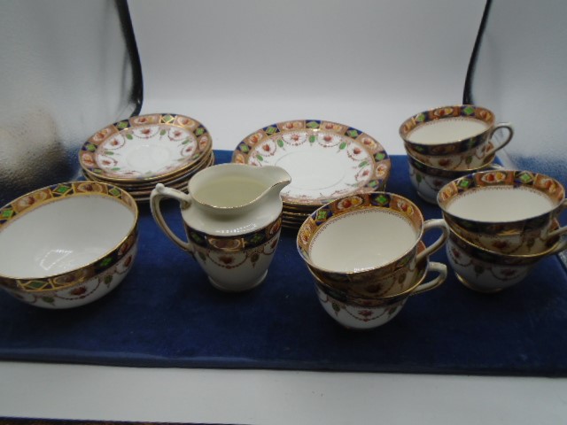 'Sandon' tea set, made in England. includes 6 x cups and saucers, 6 x cake/sandwich plates, milk