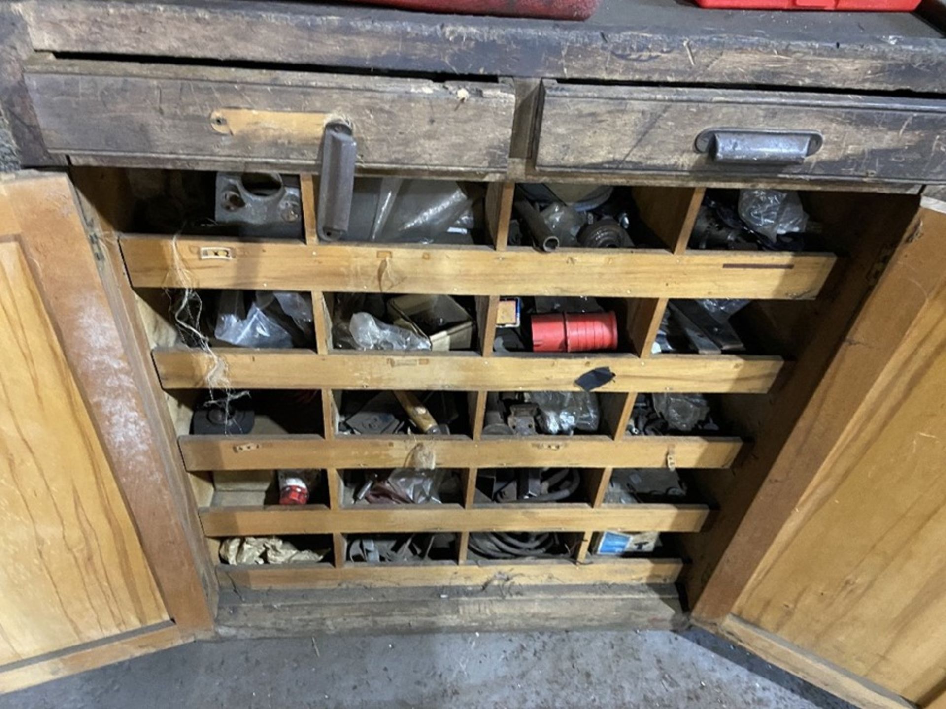 Vintage wood storage cupboard with contents