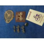collection of bicycle brooches and plaque penny farthing