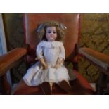 A beautiful vintage (Victorian/Edwardian era) Armand Marseille Composite doll with bisque face