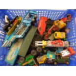 collection of unboxed toy cars, lorries etc