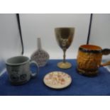 Cycle related items including musical mug and a metal goblet with Penny farthing