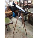 Telescope on wooden tripod