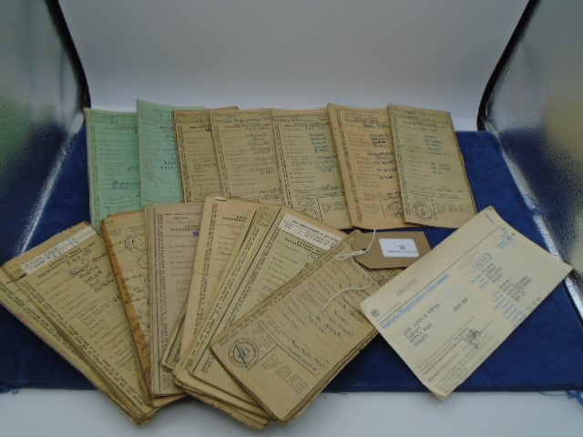 Approx 25 Vintage motor vehicle registration books with various dates from 1935 to 1968 incl Ford,