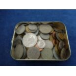 Tobacco tin of mixed foreign coinage (mostly modern)