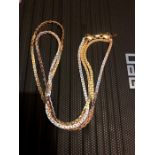 Chain link silver and gold coloured double necklace