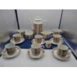 Staffordshire midwinter tea set comprising of tea pot, 6 cups and saucers, 2 sugar bowls and egg