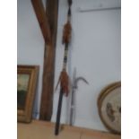 Tribal spear with a futher metal hunting impliment