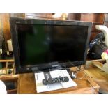 Panasonic 26 inch TV with remote and booklet