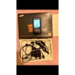 Samsung D900i mobile phone with charger and box