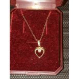 Heart Pendant with central white stone on 9ct chain