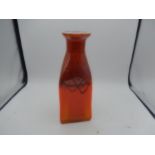 Orange glass triangular vase