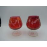 2 cranberry glasses