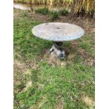 Round concrete pedestal garden table