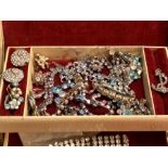 Jewellery box containing assorted rhinestone jewellery ( some missing stones )