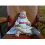 An Armand Marseille vintage (Edwardian era) composite doll, bisque face, marked '351' 16 inches with