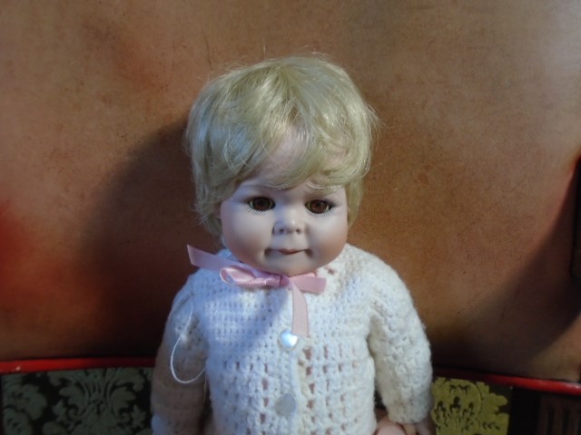 A full body porcelain doll Simsco world of dolls, marked '85 - W' 15 inches dressed in pink and - Image 2 of 4