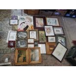 collection of framed pictures