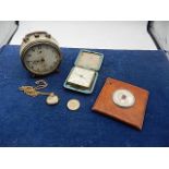 collection of alarm clocks, dress watches, barometer and a 1986 £2 coin