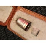Cased silver thimble