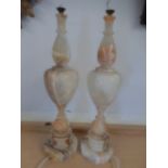 Pair of Alabaster lamp bases 56cm tall, have been repaired in places. .see pics