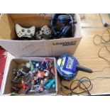 assortment of computer accessories: around 12 xbox/ playstation controllers, portal player stand and