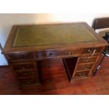 Twin pedestal desk with green leather insert 42 inches wide 23 deep 29 tall
