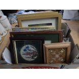 box of pictures and frames