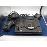 Sega Mega drive 16 bit console with 2 controllers and 7 games ( a/f )
