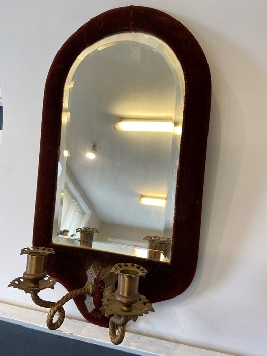 Victorian mirrored wall sconce with velvet surround and beveled mirror with two brass candle holders