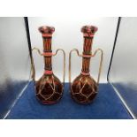 2 decorative spanish bottles