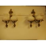 Pair of decorative brass wall lights with glass shades